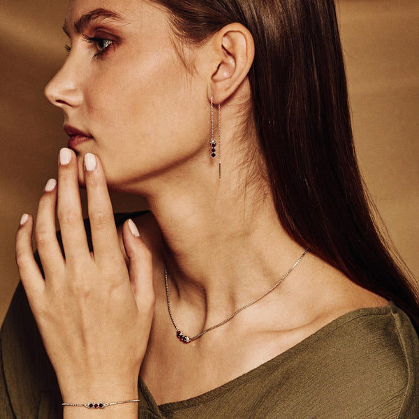 model wearing San Shi Garnet chain Earrings, necklace and bracelet matching set Sterling Silver - Tsai x Tsai | Luxury Gemstone Jewellery Gift