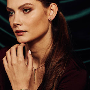 model wearing San Shi Peridot Stud Earrings, 18 ct Rose Gold Vermeil and Pinglin necklace and bracelet set - Tsai x Tsai | Luxury Gemstone Jewellery Gift